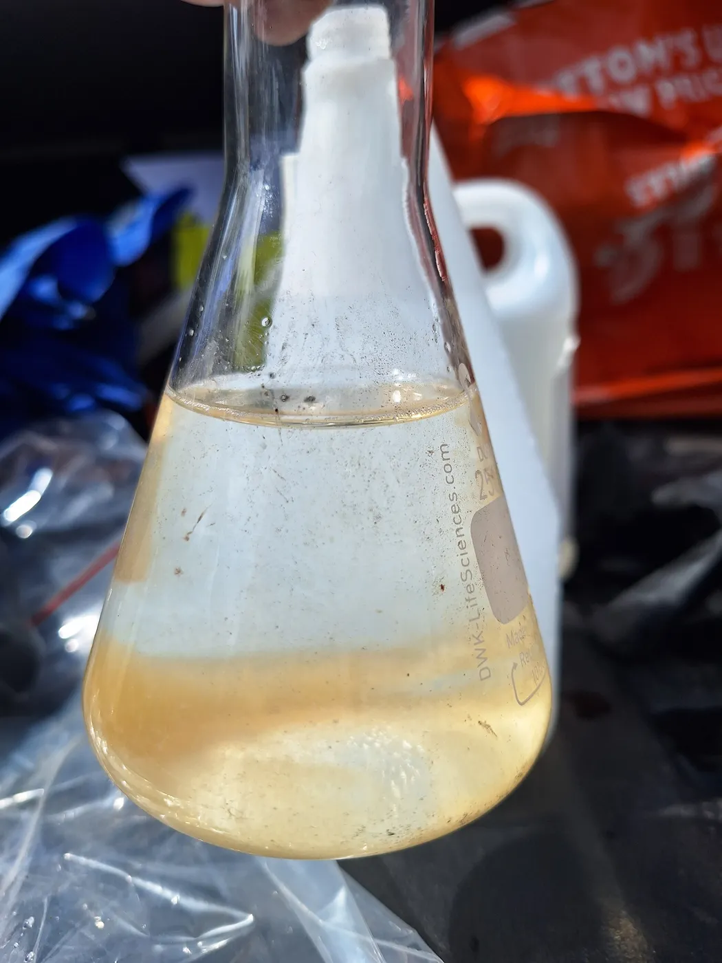 A representative site-water sample in a jar-testing flask